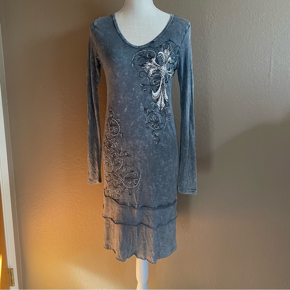 Long sleeve, embellished dress.